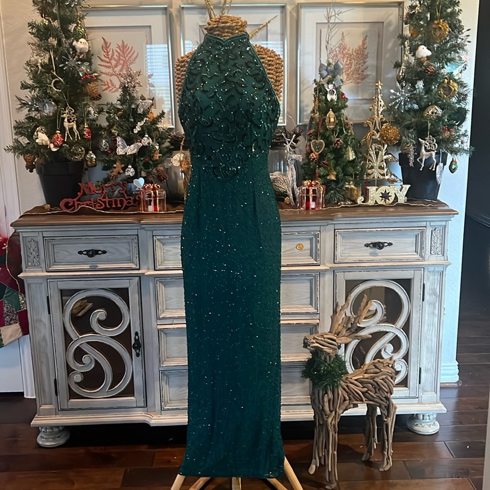 Full length halter top embellished party dress.. some damage at the bottom